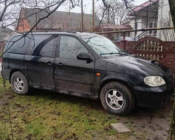 Черный Киа Карнивал, объемом двигателя 2.8 л и пробегом 300 тыс. км за 3800 $, фото 3 на Automoto.ua