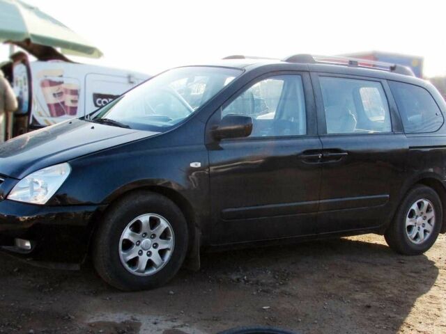 Черный Киа Карнивал, объемом двигателя 2.7 л и пробегом 207 тыс. км за 5200 $, фото 4 на Automoto.ua