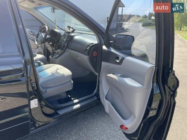 Черный Киа Карнивал, объемом двигателя 2.9 л и пробегом 222 тыс. км за 6300 $, фото 30 на Automoto.ua
