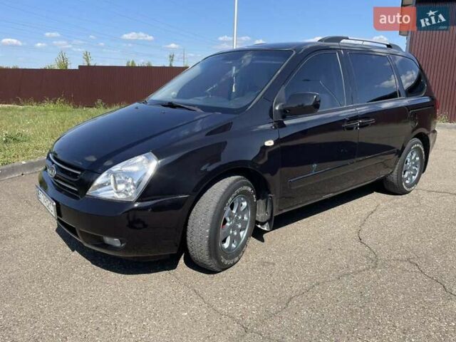 Черный Киа Карнивал, объемом двигателя 2.9 л и пробегом 222 тыс. км за 6300 $, фото 1 на Automoto.ua