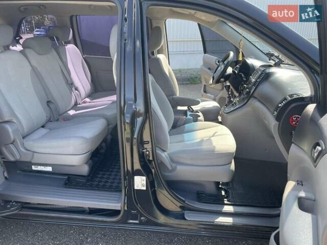 Черный Киа Карнивал, объемом двигателя 2.9 л и пробегом 223 тыс. км за 6300 $, фото 22 на Automoto.ua