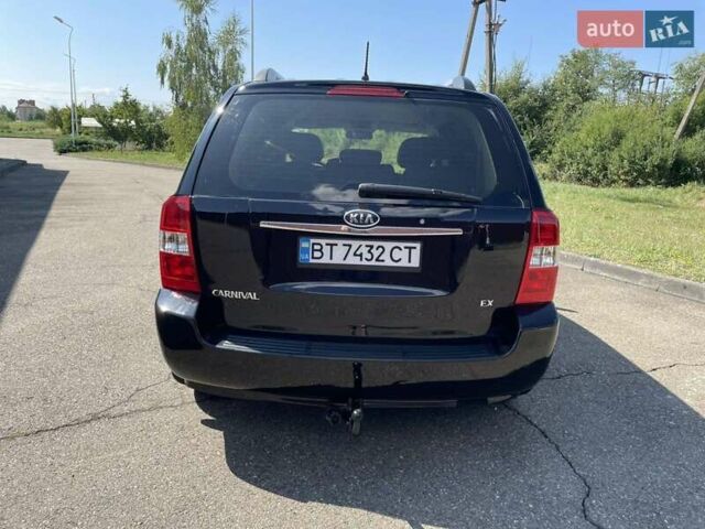 Черный Киа Карнивал, объемом двигателя 2.9 л и пробегом 222 тыс. км за 6300 $, фото 3 на Automoto.ua