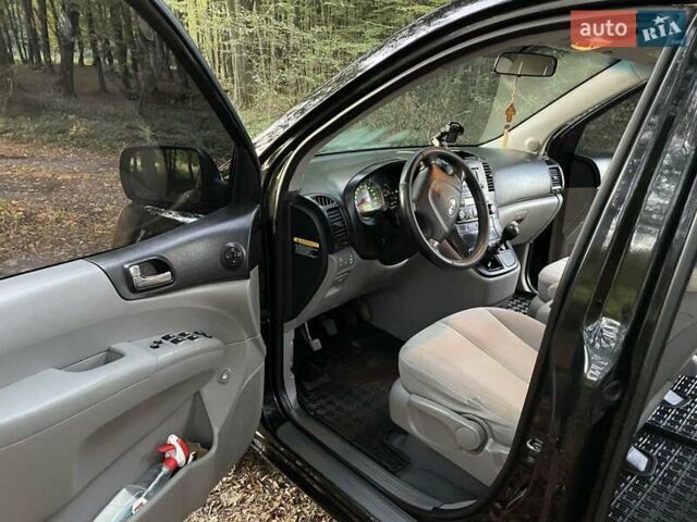 Черный Киа Карнивал, объемом двигателя 2.9 л и пробегом 223 тыс. км за 5700 $, фото 41 на Automoto.ua