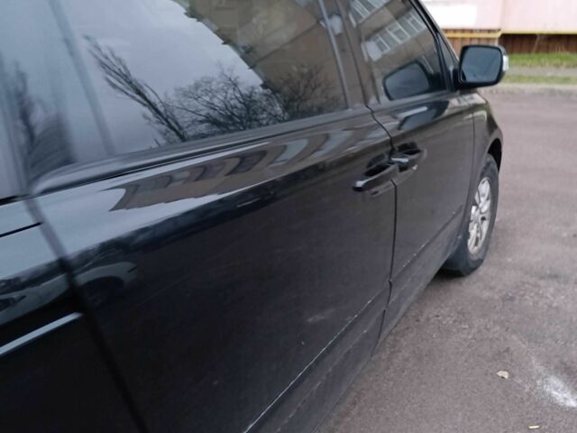 Черный Киа Карнивал, объемом двигателя 2.9 л и пробегом 174 тыс. км за 8774 $, фото 6 на Automoto.ua