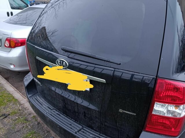 Черный Киа Карнивал, объемом двигателя 2.9 л и пробегом 174 тыс. км за 8774 $, фото 2 на Automoto.ua