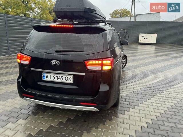 Киа Карнивал 2014 в Киеве на Automoto.ua Черный Киа Карнивал, объемом двигателя 2.2 л и пробегом 290 тыс. км за 18500 $, фото 21 на Automoto.ua