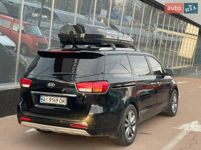 Черный Киа Карнивал, объемом двигателя 2.2 л и пробегом 295 тыс. км за 15900 $, фото 3 на Automoto.ua