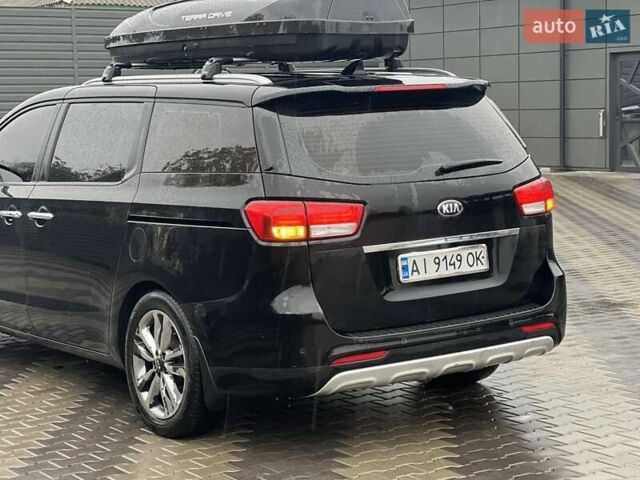 Киа Карнивал 2014 в Киеве на Automoto.ua Черный Киа Карнивал, объемом двигателя 2.2 л и пробегом 290 тыс. км за 18500 $, фото 19 на Automoto.ua