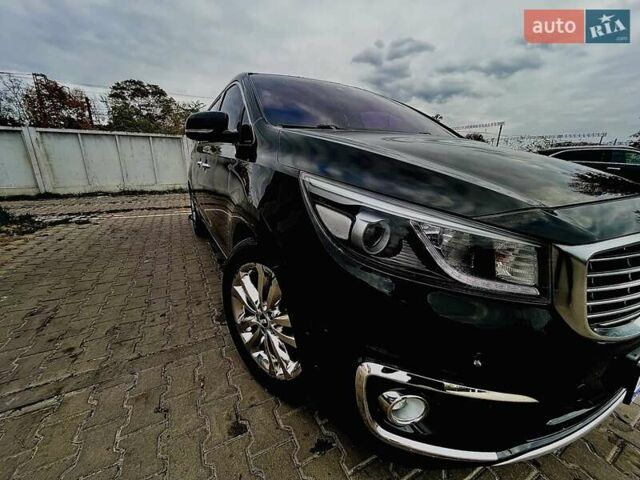 Черный Киа Карнивал, объемом двигателя 2.2 л и пробегом 215 тыс. км за 21700 $, фото 1 на Automoto.ua