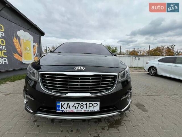 Черный Киа Карнивал, объемом двигателя 2.2 л и пробегом 215 тыс. км за 21700 $, фото 2 на Automoto.ua