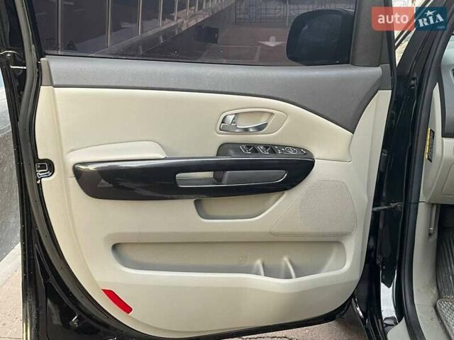 Черный Киа Карнивал, объемом двигателя 2.2 л и пробегом 295 тыс. км за 15900 $, фото 13 на Automoto.ua