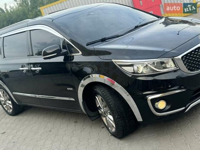 Черный Киа Карнивал, объемом двигателя 2.2 л и пробегом 227 тыс. км за 20500 $, фото 1 на Automoto.ua