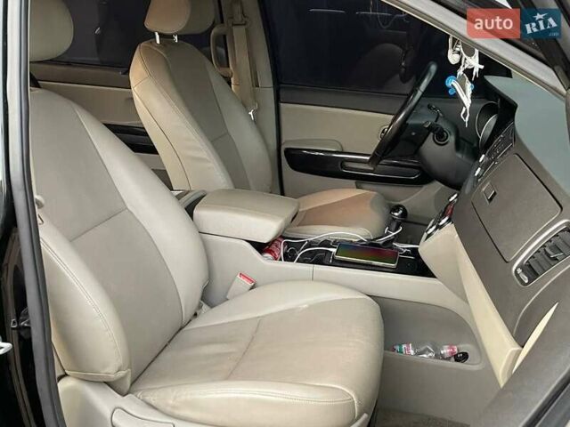Черный Киа Карнивал, объемом двигателя 2.2 л и пробегом 295 тыс. км за 15900 $, фото 9 на Automoto.ua