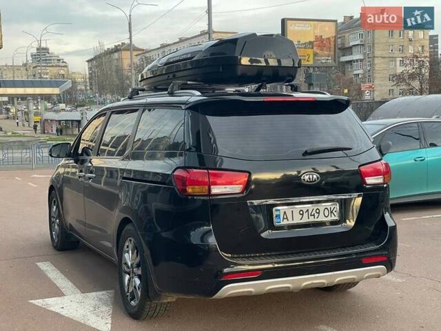 Черный Киа Карнивал, объемом двигателя 2.2 л и пробегом 295 тыс. км за 15900 $, фото 4 на Automoto.ua