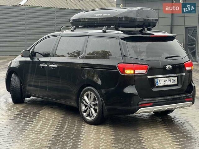 Киа Карнивал 2014 в Киеве на Automoto.ua Черный Киа Карнивал, объемом двигателя 2.2 л и пробегом 290 тыс. км за 18500 $, фото 10 на Automoto.ua