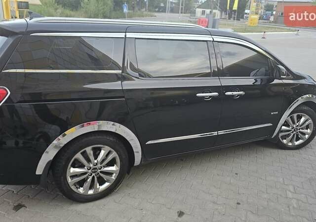 Черный Киа Карнивал, объемом двигателя 2.2 л и пробегом 227 тыс. км за 20500 $, фото 3 на Automoto.ua