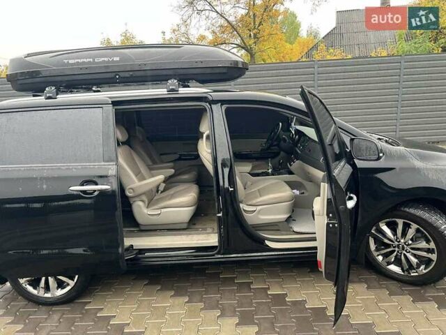 Киа Карнивал 2014 в Киеве на Automoto.ua Черный Киа Карнивал, объемом двигателя 2.2 л и пробегом 290 тыс. км за 18500 $, фото 8 на Automoto.ua