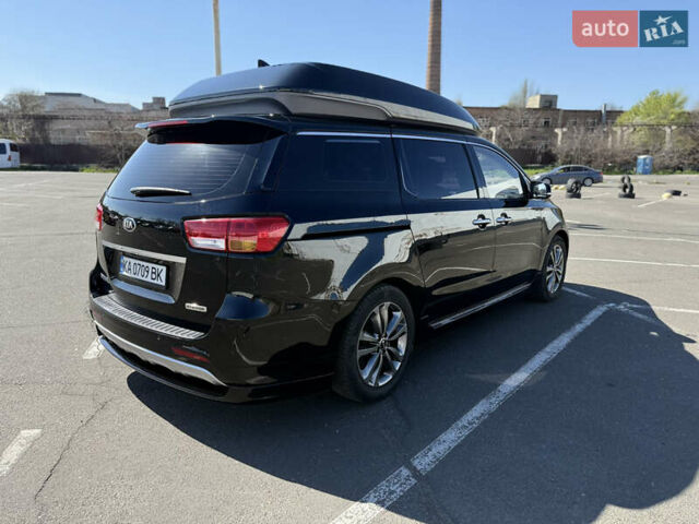 Черный Киа Карнивал, объемом двигателя 2.2 л и пробегом 180 тыс. км за 23500 $, фото 2 на Automoto.ua
