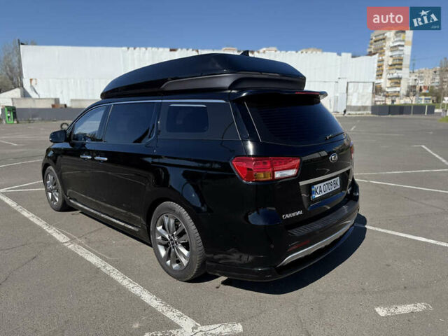 Черный Киа Карнивал, объемом двигателя 2.2 л и пробегом 180 тыс. км за 23500 $, фото 3 на Automoto.ua