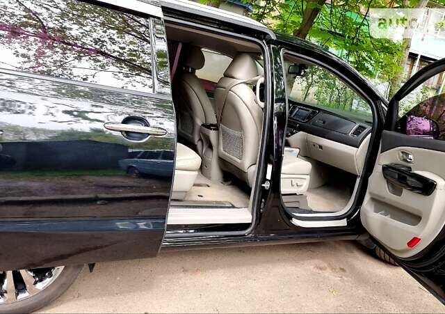Черный Киа Карнивал, объемом двигателя 2.2 л и пробегом 250 тыс. км за 23550 $, фото 35 на Automoto.ua