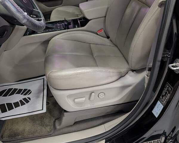 Черный Киа Карнивал, объемом двигателя 2.2 л и пробегом 299 тыс. км за 16500 $, фото 7 на Automoto.ua