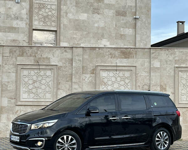 Черный Киа Карнивал, объемом двигателя 2.2 л и пробегом 149 тыс. км за 23500 $, фото 4 на Automoto.ua