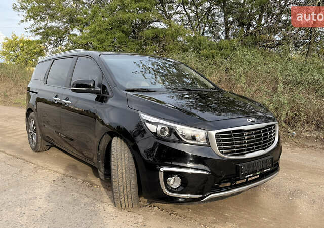 Черный Киа Карнивал, объемом двигателя 2.2 л и пробегом 105 тыс. км за 19900 $, фото 1 на Automoto.ua
