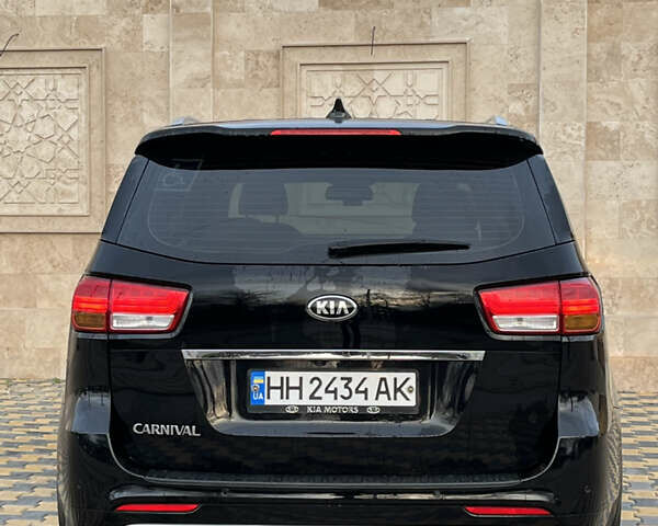 Черный Киа Карнивал, объемом двигателя 2.2 л и пробегом 149 тыс. км за 23500 $, фото 5 на Automoto.ua