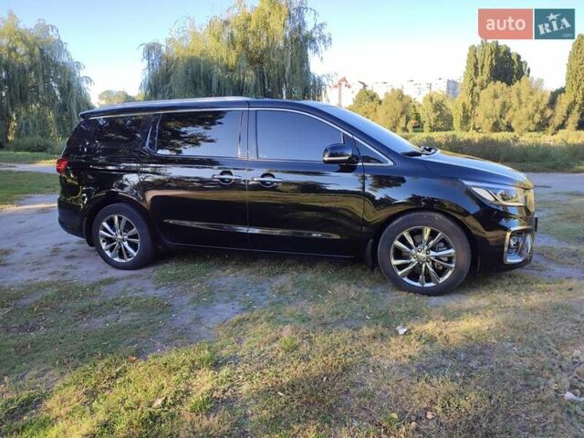 Черный Киа Карнивал, объемом двигателя 2.2 л и пробегом 103 тыс. км за 29500 $, фото 2 на Automoto.ua