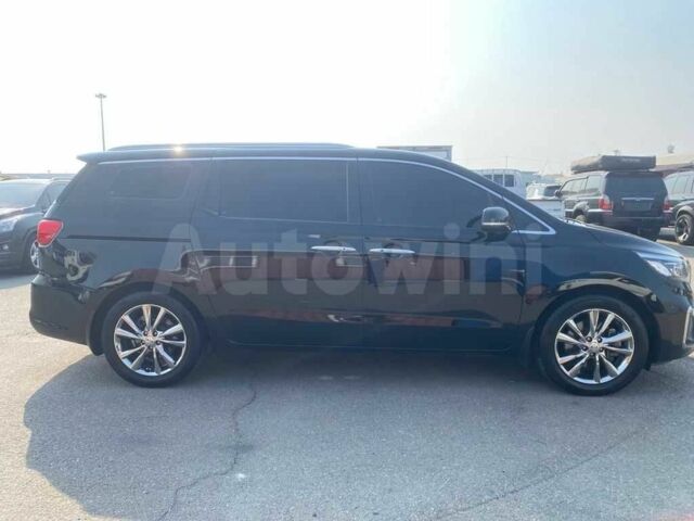 Чорний Кіа Карнівал, об'ємом двигуна 2.2 л та пробігом 56 тис. км за 14600 $, фото 3 на Automoto.ua