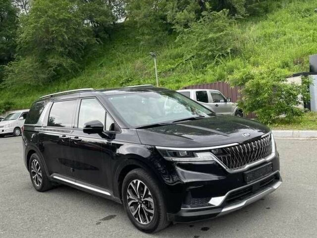 Черный Киа Карнивал, объемом двигателя 2.2 л и пробегом 42 тыс. км за 13000 $, фото 1 на Automoto.ua