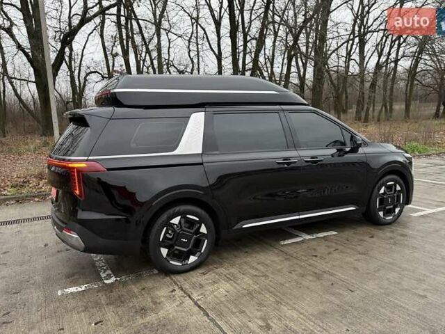 Черный Киа Карнивал, объемом двигателя 2.2 л и пробегом 12 тыс. км за 67000 $, фото 5 на Automoto.ua