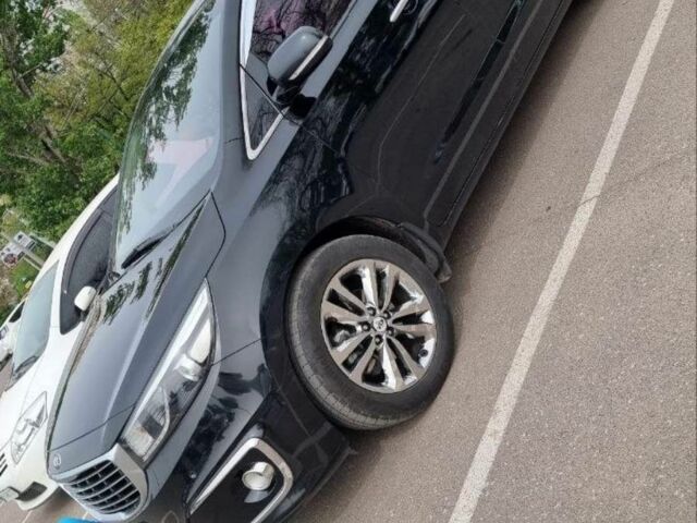 Черный Киа Карнивал, объемом двигателя 2 л и пробегом 250 тыс. км за 23000 $, фото 1 на Automoto.ua