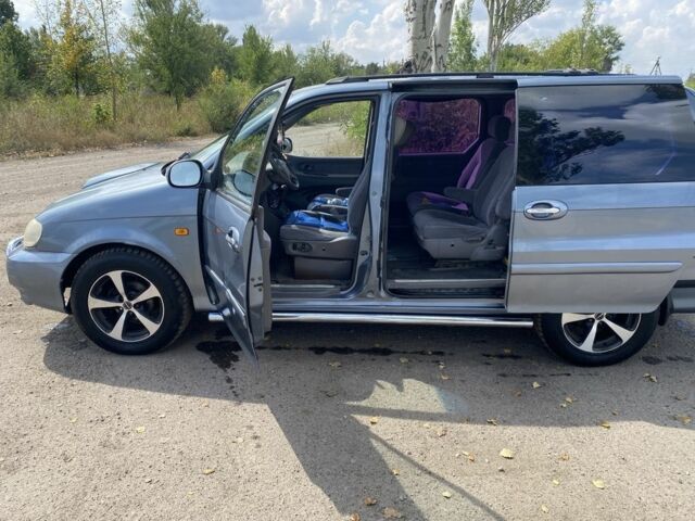 Коричневый Киа Карнивал, объемом двигателя 2.9 л и пробегом 320 тыс. км за 2700 $, фото 4 на Automoto.ua