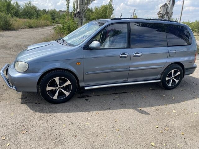 Коричневый Киа Карнивал, объемом двигателя 2.9 л и пробегом 320 тыс. км за 2700 $, фото 1 на Automoto.ua