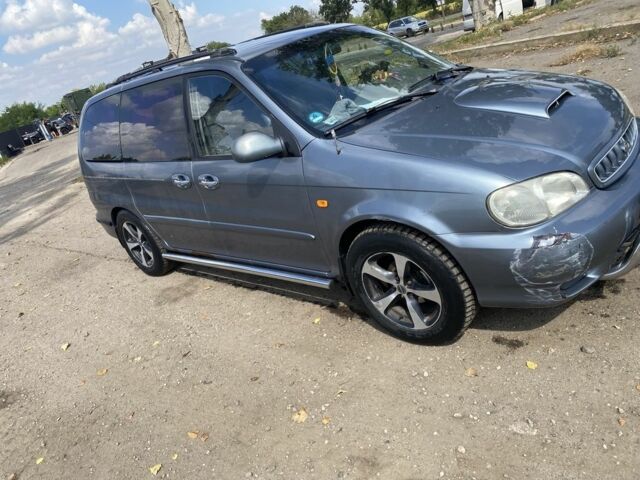 Коричневый Киа Карнивал, объемом двигателя 2.9 л и пробегом 320 тыс. км за 2700 $, фото 2 на Automoto.ua