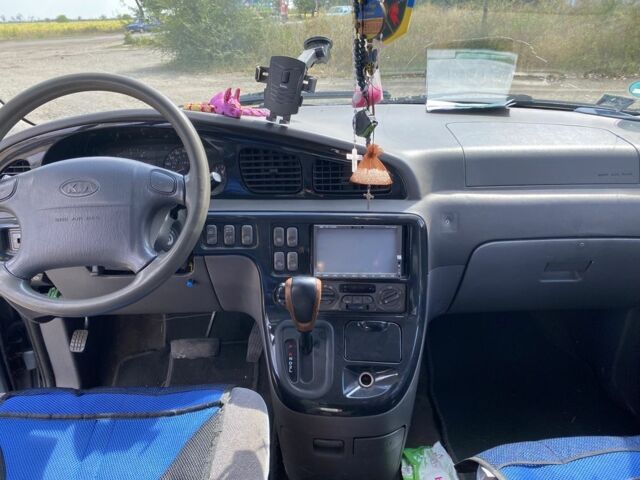 Коричневый Киа Карнивал, объемом двигателя 2.9 л и пробегом 320 тыс. км за 2700 $, фото 5 на Automoto.ua