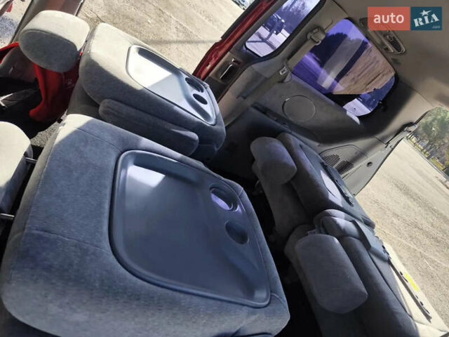 Красный Киа Карнивал, объемом двигателя 2.9 л и пробегом 250 тыс. км за 6000 $, фото 23 на Automoto.ua