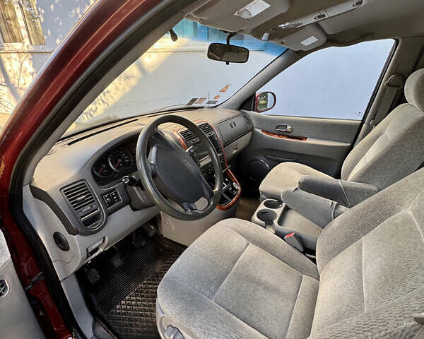 Красный Киа Карнивал, объемом двигателя 2.9 л и пробегом 250 тыс. км за 6000 $, фото 12 на Automoto.ua