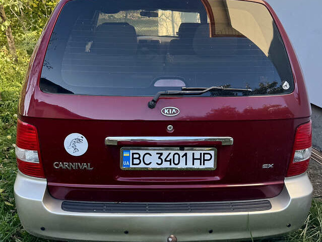 Красный Киа Карнивал, объемом двигателя 2.9 л и пробегом 250 тыс. км за 6000 $, фото 3 на Automoto.ua