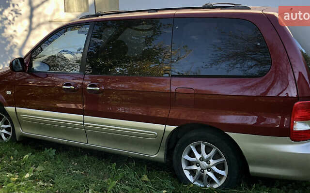 Красный Киа Карнивал, объемом двигателя 2.9 л и пробегом 250 тыс. км за 6000 $, фото 4 на Automoto.ua