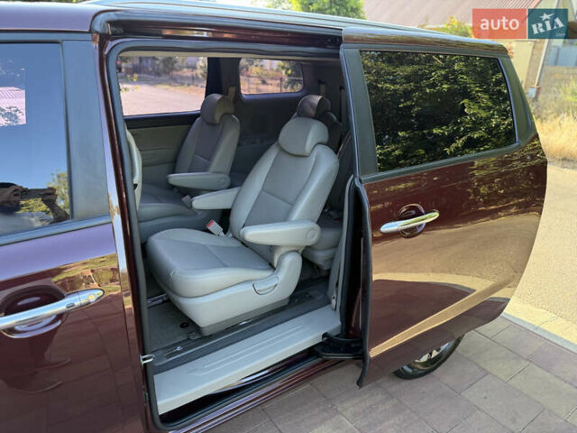 Красный Киа Карнивал, объемом двигателя 2.2 л и пробегом 110 тыс. км за 23000 $, фото 11 на Automoto.ua