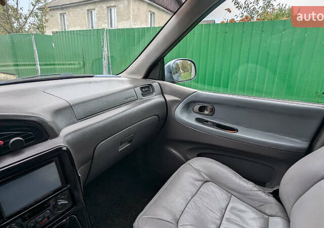 Серый Киа Карнивал, объемом двигателя 2.9 л и пробегом 350 тыс. км за 2150 $, фото 16 на Automoto.ua