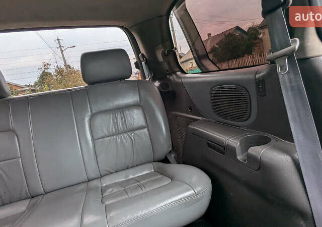 Серый Киа Карнивал, объемом двигателя 2.9 л и пробегом 350 тыс. км за 2150 $, фото 24 на Automoto.ua