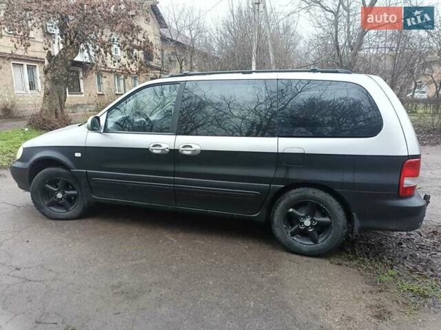 Серый Киа Карнивал, объемом двигателя 2.9 л и пробегом 348 тыс. км за 4300 $, фото 1 на Automoto.ua