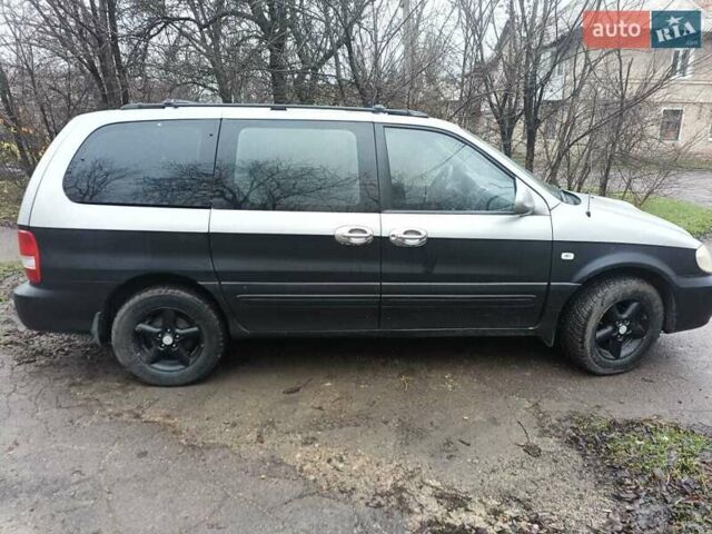Серый Киа Карнивал, объемом двигателя 2.9 л и пробегом 348 тыс. км за 4300 $, фото 2 на Automoto.ua