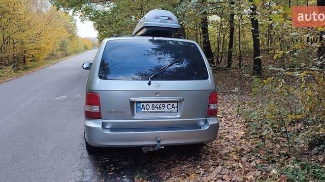 Серый Киа Карнивал, объемом двигателя 2.9 л и пробегом 413 тыс. км за 3700 $, фото 1 на Automoto.ua