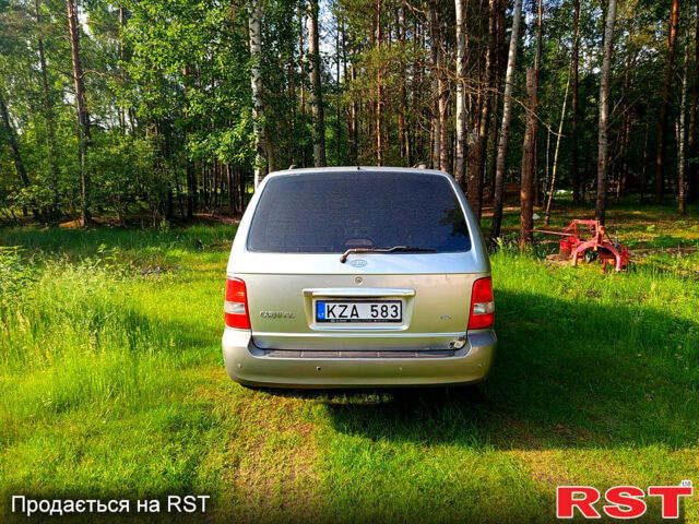 Серый Киа Карнивал, объемом двигателя 3 л и пробегом 302 тыс. км за 2500 $, фото 3 на Automoto.ua