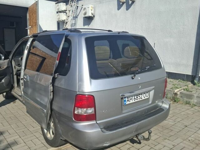 Серый Киа Карнивал, объемом двигателя 2.9 л и пробегом 318 тыс. км за 2021 $, фото 4 на Automoto.ua