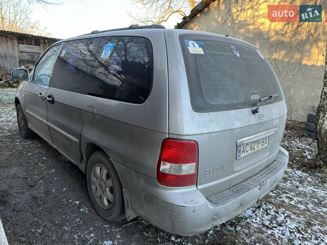 Серый Киа Карнивал, объемом двигателя 2.9 л и пробегом 300 тыс. км за 1550 $, фото 4 на Automoto.ua